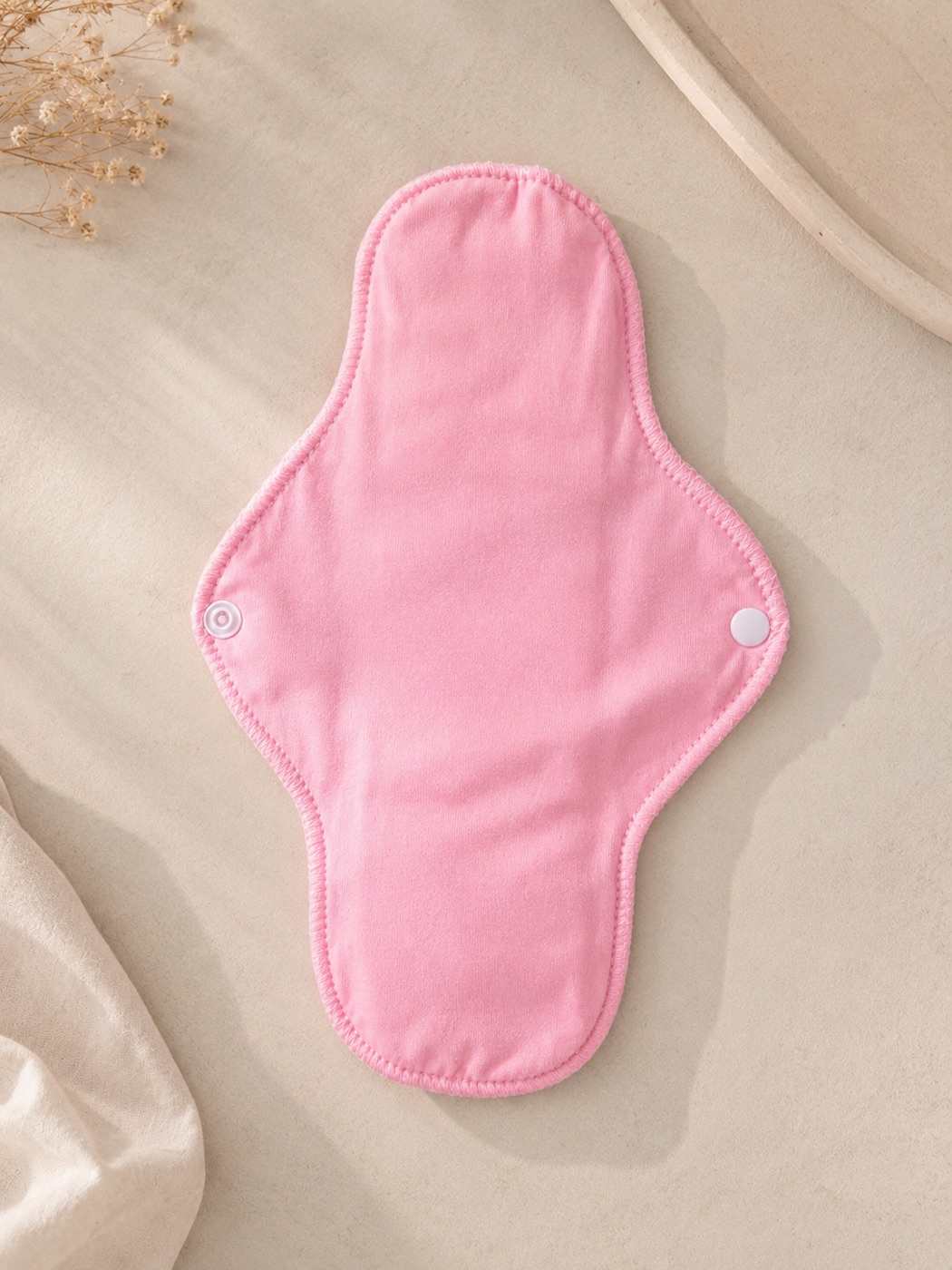 Cloth pad opened flat with snap wings
